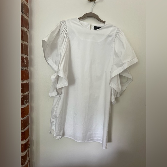 🪩 White dramatic flutter sleeve mini dress- has pockets! - Picture 9 of 10